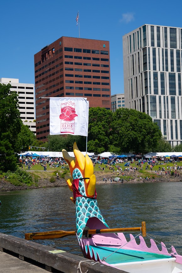 Tail of a Traditional-Style Dragon Boat with a Sponsorship Flag: Portland Rose Festival