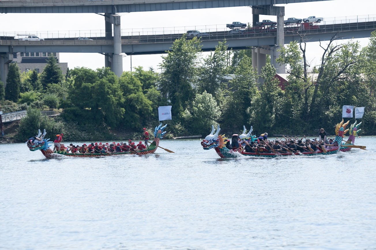 2 Traditional-Style Dragon Boats in a race.