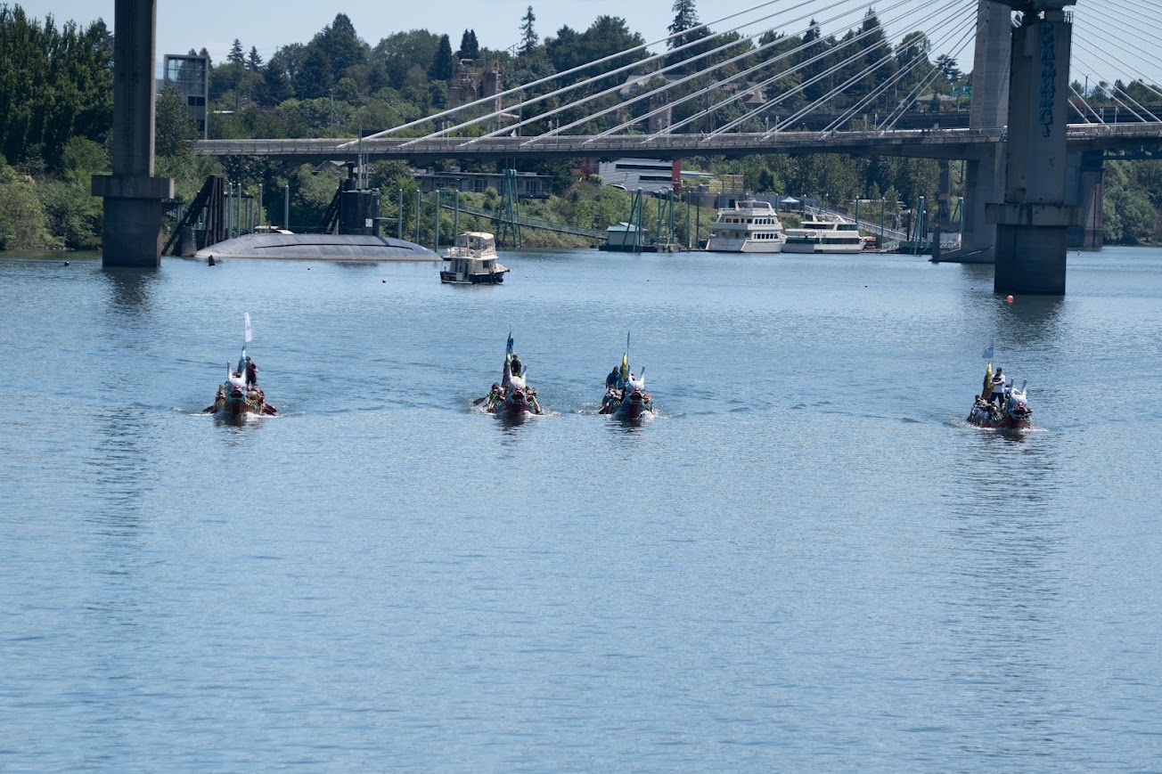 Traditional-Style Dragon Boats mid-race.